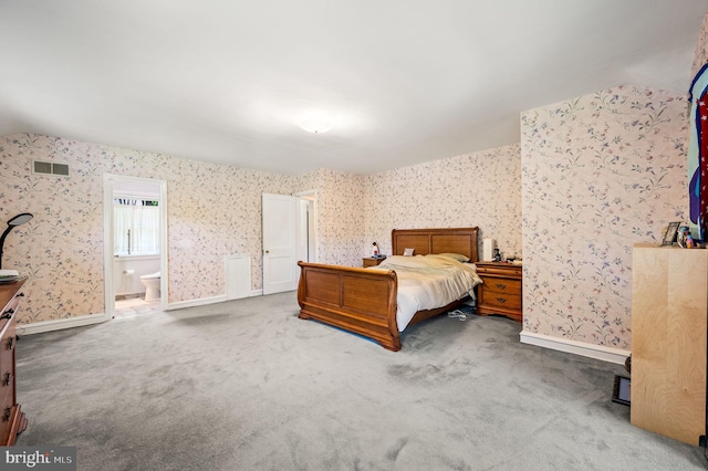 213 Rices Mill Rd, Wyncote, PA 19095 - carpeted bedroom with wallpapered walls, lofted ceiling, and ensuite bathroom