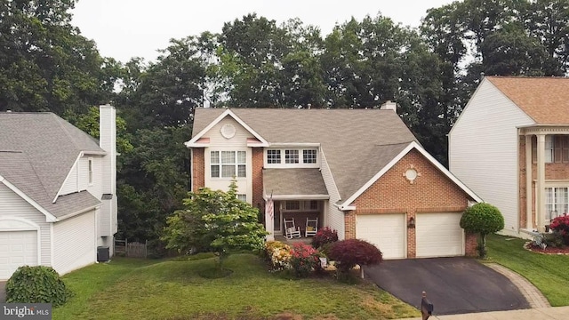 9348 Amaryllis Ave, Manassas, VA 20110 - traditional-style home with brick siding, a front lawn, driveway, and cooling unit