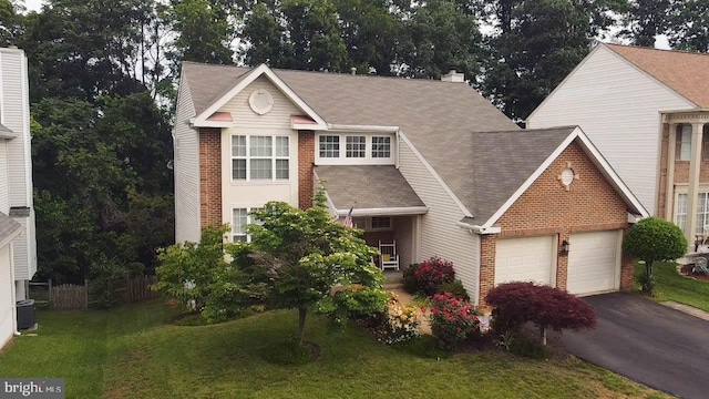 9348 Amaryllis Ave, Manassas, VA 20110 - view of front facade featuring driveway, brick siding, a chimney, a shingled roof, and a garage