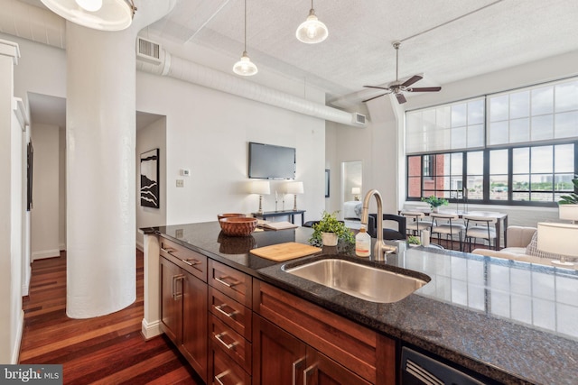 2429 Locust St Unit 504, Philadelphia, PA 19103 - kitchen with a sink, open floor plan, dark wood-style floors, a ceiling fan, and a textured ceiling