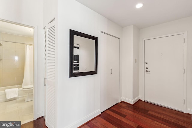 2429 Locust St Unit 504, Philadelphia, PA 19103 - foyer with dark wood-style flooring, baseboards, and recessed lighting