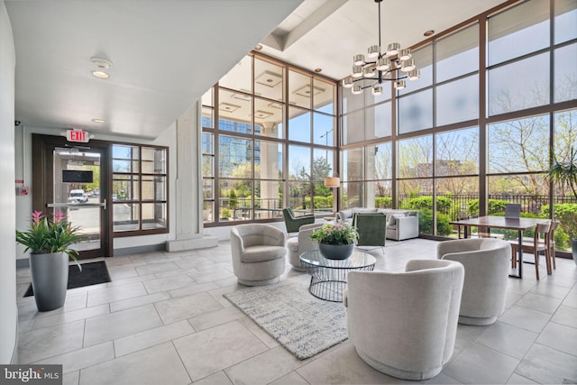 2429 Locust St Unit 504, Philadelphia, PA 19103 - building lobby featuring a towering ceiling and floor to ceiling windows