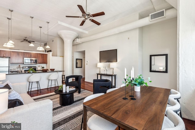 2429 Locust St Unit 504, Philadelphia, PA 19103 - living area with ceiling fan, wood finished floors, and a high ceiling