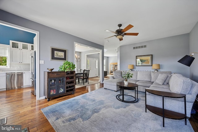 246 Honey Hollow Ln, Chalfont, PA 18914 - living area with light wood-style flooring and ceiling fan