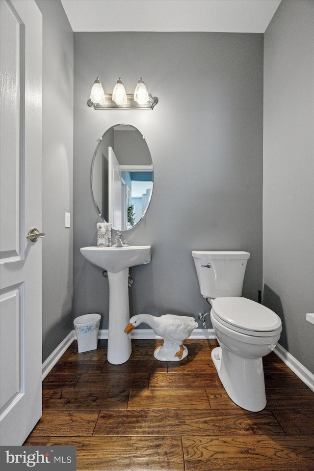 246 Honey Hollow Ln, Chalfont, PA 18914 - bathroom featuring wood finished floors, toilet, and baseboards