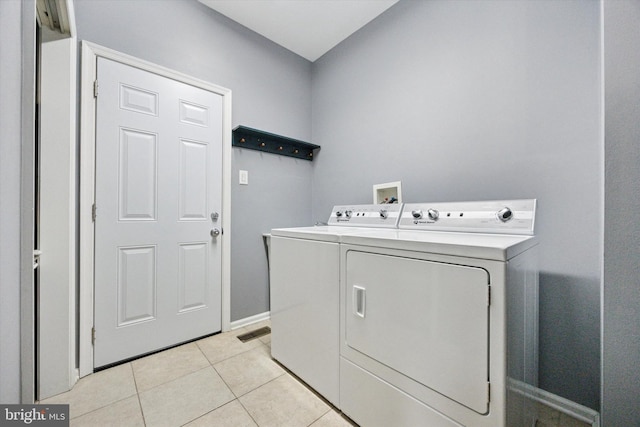 246 Honey Hollow Ln, Chalfont, PA 18914 - washroom with separate washer and dryer, baseboards, and light tile patterned flooring