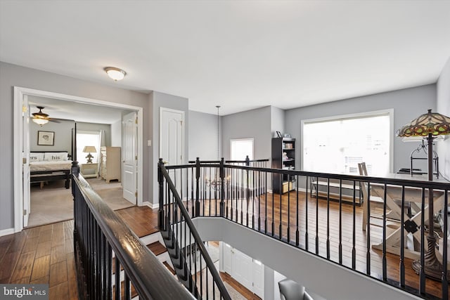 246 Honey Hollow Ln, Chalfont, PA 18914 - hallway featuring an upstairs landing, dark wood-style floors, and baseboards