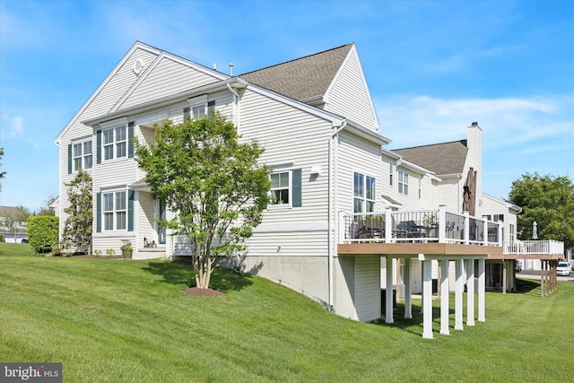246 Honey Hollow Ln, Chalfont, PA 18914 - rear view of property featuring a deck, a chimney, a lawn, and a shingled roof