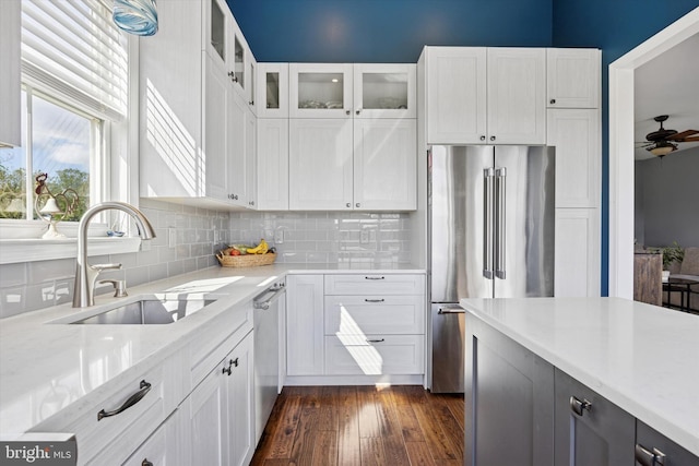 246 Honey Hollow Ln, Chalfont, PA 18914 - kitchen with appliances with stainless steel finishes, a sink, decorative backsplash, and white cabinets