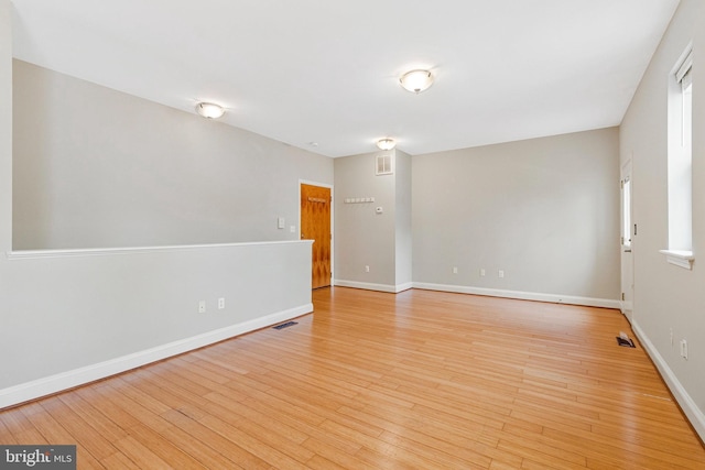 3318 Sherman Ave NW Unit 104, Washington, DC 20010 - spare room featuring light wood-style flooring and baseboards