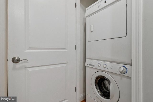 3318 Sherman Ave NW Unit 104, Washington, DC 20010 - washroom featuring estacked washer and dryer