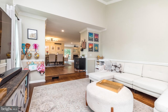 534 Country Club Dr, Lansdale, PA 19446 - living room with crown molding, wood finished floors, recessed lighting, and a fireplace