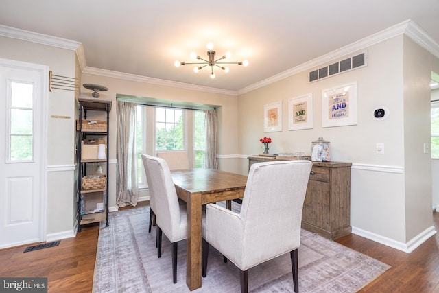 534 Country Club Dr, Lansdale, PA 19446 - dining space with wood finished floors, a chandelier, baseboards, and crown molding