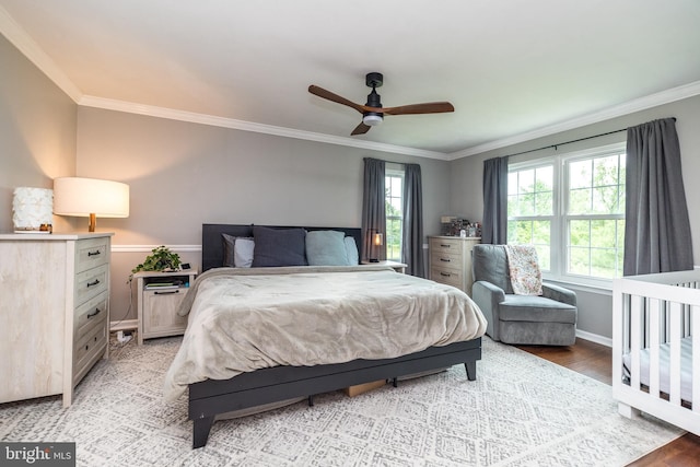 534 Country Club Dr, Lansdale, PA 19446 - bedroom featuring crown molding, light wood-type flooring, baseboards, and a ceiling fan