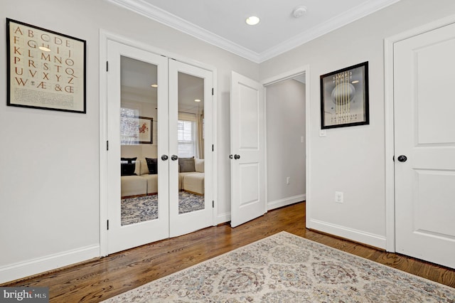 11214 Midvale Rd, Kensington, MD 20895 - bedroom featuring french doors, wood finished floors, ornamental molding, baseboards, and recessed lighting