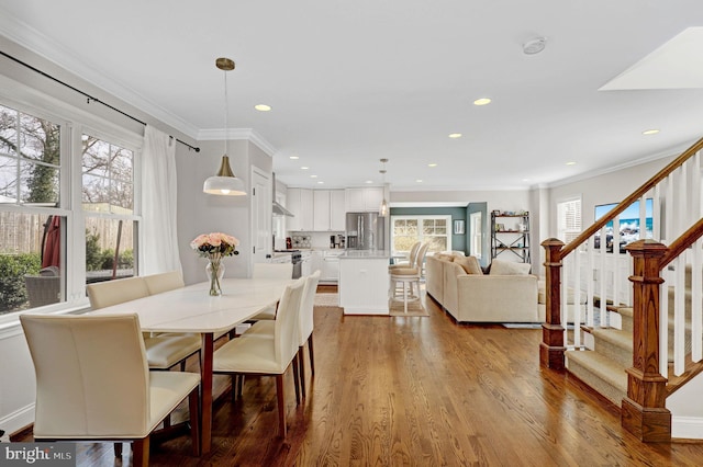 11214 Midvale Rd, Kensington, MD 20895 - dining room with plenty of natural light, stairs, recessed lighting, wood finished floors, and crown molding