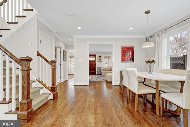 11214 Midvale Rd, Kensington, MD 20895 - dining room featuring wood finished floors, stairway, recessed lighting, baseboards, and ornamental molding