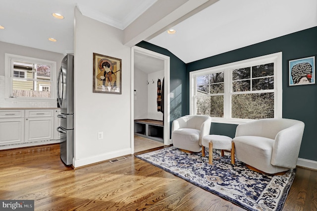 11214 Midvale Rd, Kensington, MD 20895 - living area featuring baseboards, light wood finished floors, ornamental molding, recessed lighting, and vaulted ceiling