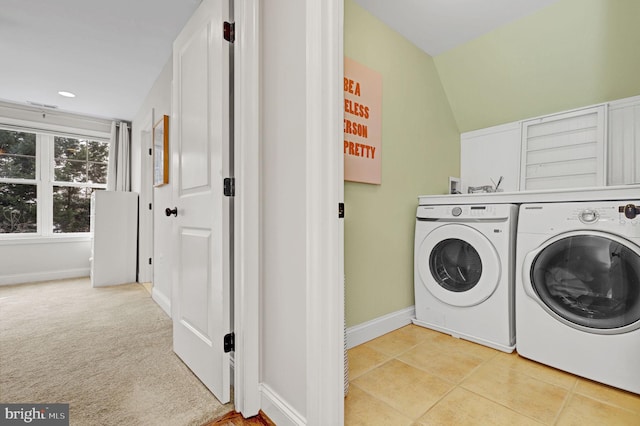 11214 Midvale Rd, Kensington, MD 20895 - laundry room featuring washer and clothes dryer, baseboards, and light tile patterned flooring