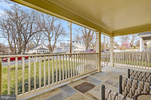 11214 Midvale Rd, Kensington, MD 20895 - porch featuring a residential view and a lawn
