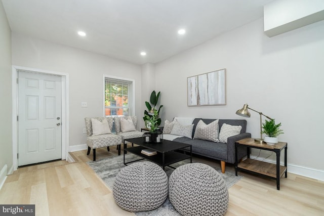 143 N Decker Ave, Baltimore, MD 21224 - living room with light wood-style floors, baseboards, and recessed lighting