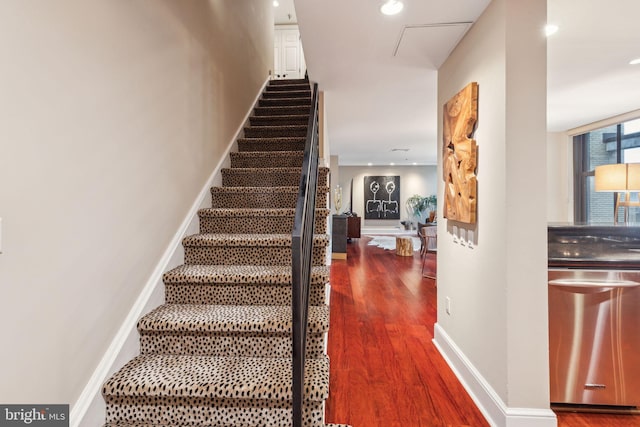 1500 Chestnut St Unit 20K, Philadelphia, PA 19102 - stairs featuring wood finished floors, baseboards, and recessed lighting