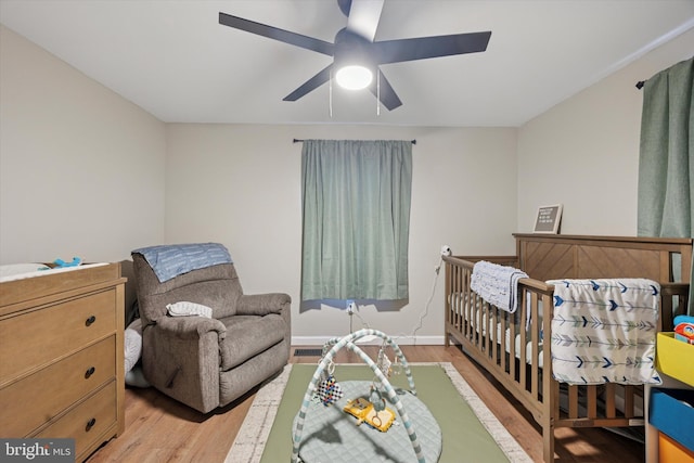 7 Neeld Ln, Aston, PA 19014 - bedroom with light wood-style floors, ceiling fan, and baseboards