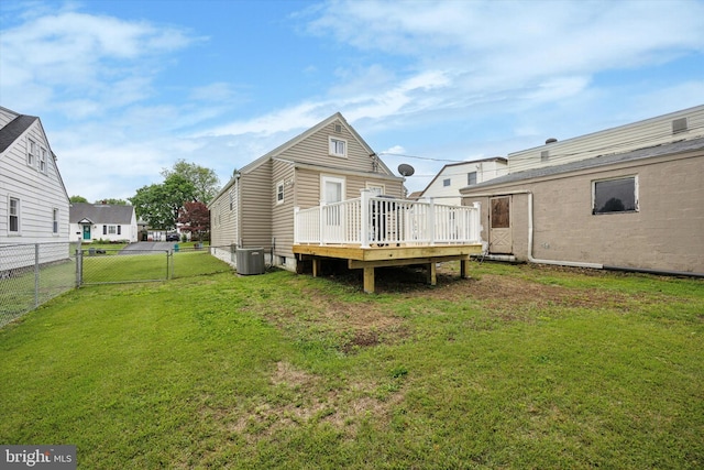 7 Neeld Ln, Aston, PA 19014 - back of property with a wooden deck, central air condition unit, and a gate