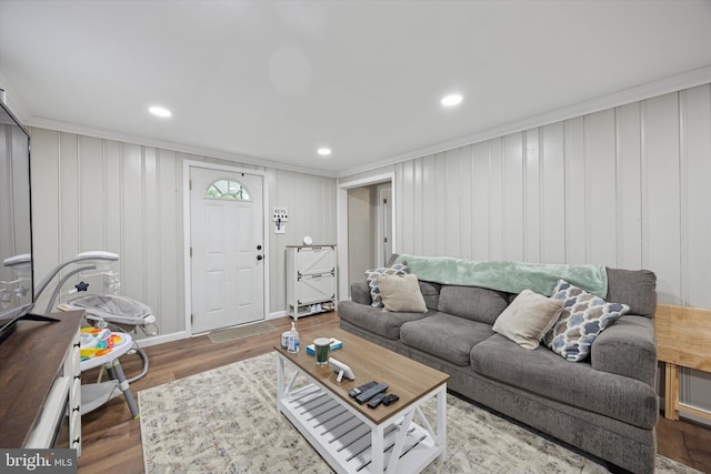 7 Neeld Ln, Aston, PA 19014 - living room featuring wood finished floors, ornamental molding, recessed lighting, and a decorative wall