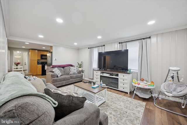 7 Neeld Ln, Aston, PA 19014 - living area featuring crown molding, wood finished floors, and recessed lighting