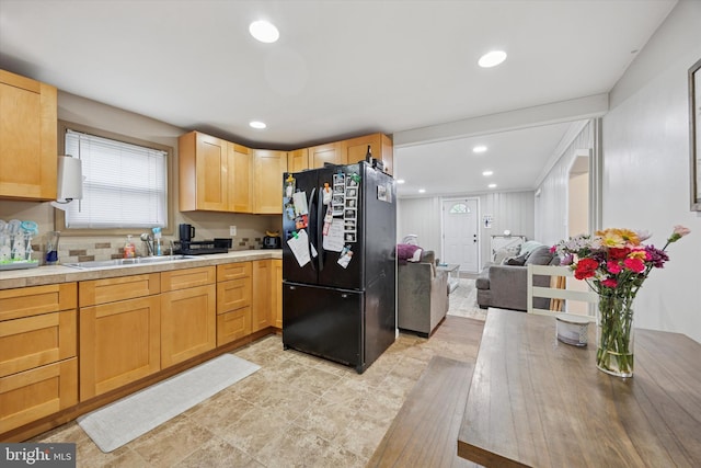 7 Neeld Ln, Aston, PA 19014 - kitchen featuring freestanding refrigerator, a sink, light brown cabinets, tile counters, and open floor plan