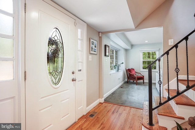 13704 Beret Pl, Silver Spring, MD 20906 - foyer entrance featuring stairs, light wood-style flooring, and baseboards