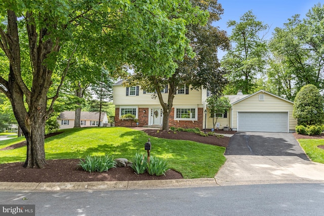 13704 Beret Pl, Silver Spring, MD 20906 - colonial home with brick siding, a front lawn, and driveway