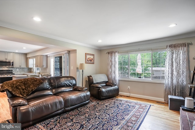 13704 Beret Pl, Silver Spring, MD 20906 - living room featuring light wood-style floors, baseboards, recessed lighting, and ornamental molding