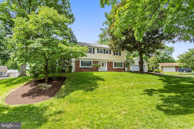 13704 Beret Pl, Silver Spring, MD 20906 - colonial-style house with brick siding and a front lawn
