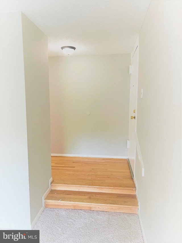 8015 Mandan Rd Unit 203, Greenbelt, MD 20770 - stairway featuring baseboards and wood finished floors