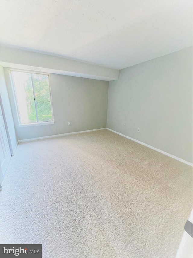 8015 Mandan Rd Unit 203, Greenbelt, MD 20770 - carpeted spare room featuring baseboards