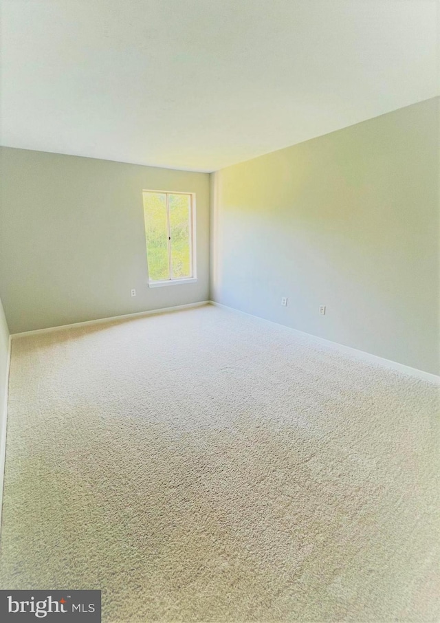 8015 Mandan Rd Unit 203, Greenbelt, MD 20770 - carpeted spare room featuring baseboards