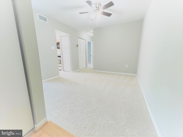 8015 Mandan Rd Unit 203, Greenbelt, MD 20770 - unfurnished room featuring ceiling fan, baseboards, and light colored carpet