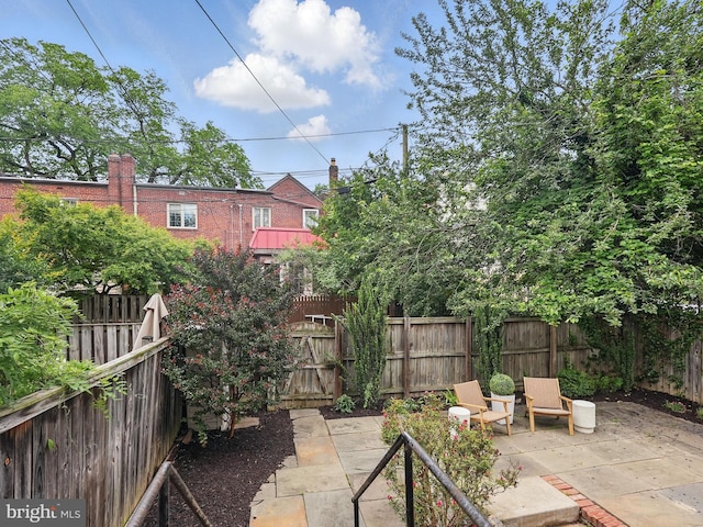 711 Avon Pl, Alexandria, VA 22314 - fenced backyard featuring a patio