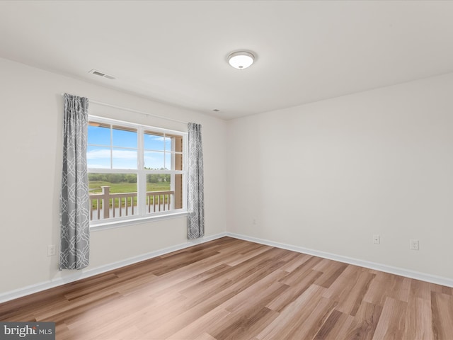 24238 Zinfandel Ln Unit R307, Lewes, DE 19958 - spare room with wood finished floors and baseboards
