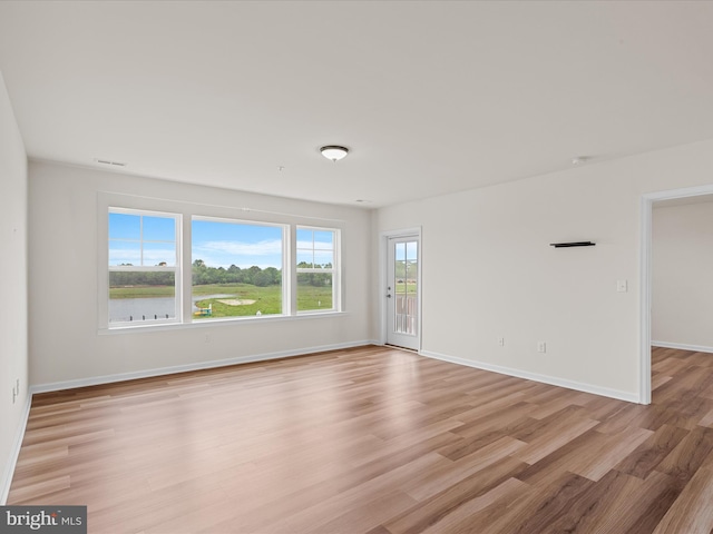 24238 Zinfandel Ln Unit R307, Lewes, DE 19958 - unfurnished room with light wood-style floors and baseboards