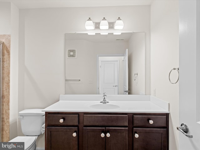 24238 Zinfandel Ln Unit R307, Lewes, DE 19958 - bathroom featuring toilet, vanity, and tiled shower