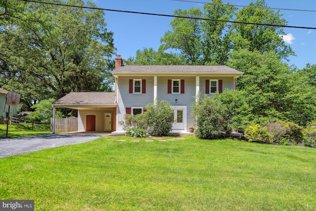 2445 Parallel Ln, Silver Spring, MD 20904 - colonial inspired home featuring driveway, a chimney, and an attached carport