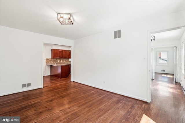 2445 Parallel Ln, Silver Spring, MD 20904 - unfurnished living room with dark wood finished floors and baseboards