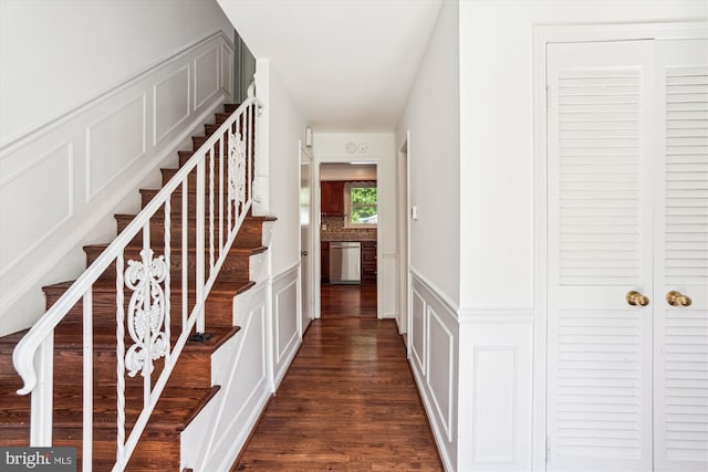 2445 Parallel Ln, Silver Spring, MD 20904 - corridor with a decorative wall, stairway, dark wood finished floors, and wainscoting