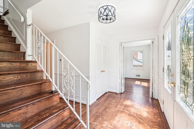 2445 Parallel Ln, Silver Spring, MD 20904 - foyer featuring stairs, a chandelier, and wood finished floors