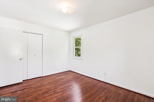 2445 Parallel Ln, Silver Spring, MD 20904 - unfurnished bedroom with wood finished floors, baseboards, and a closet