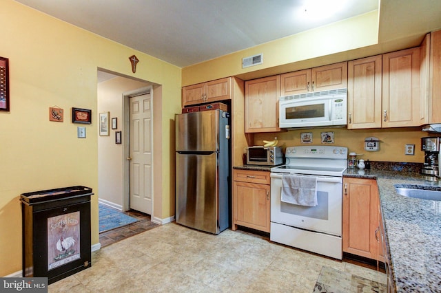 56 Zachary Dr, Chalfont, PA 18914 - kitchen featuring white appliances, dark stone countertops, and baseboards