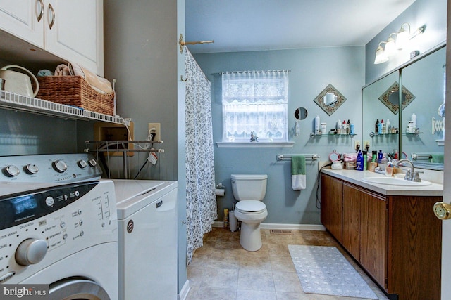 56 Zachary Dr, Chalfont, PA 18914 - bathroom featuring washing machine and dryer, toilet, vanity, baseboards, and tile patterned floors
